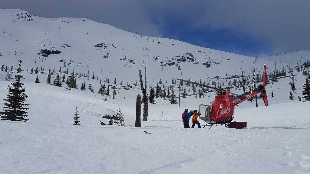 helicopter on snowy mountain
