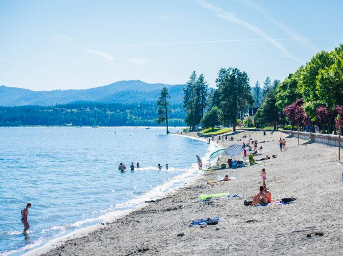 Soaking up the sun at City Park & Beach in Coeur d’Alene. Photo Credit: Idaho Tourism