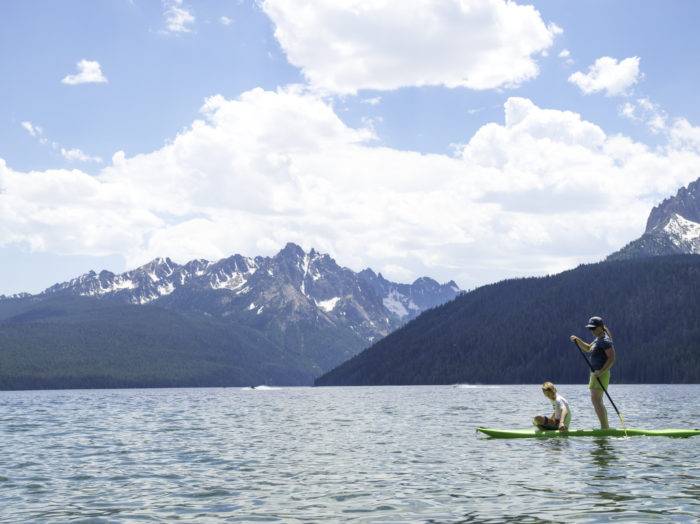 You can see why the Sawtooth mountains make Redfish Lake the ideal place to paddle board.