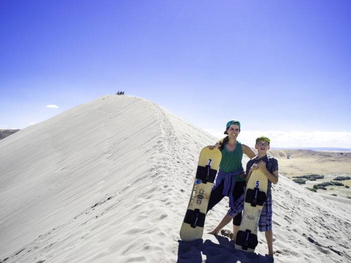 It was quite a workout hiking up the sand dunes, but so much fun sandboarding down them!