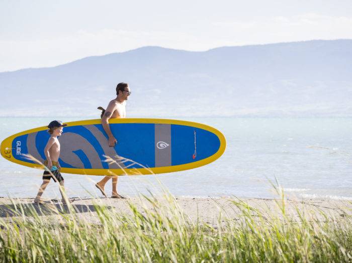 Stand Up Paddle Boarding, Bear Lake State Park, St. Charles. Photo Credit: Idaho Tourism.