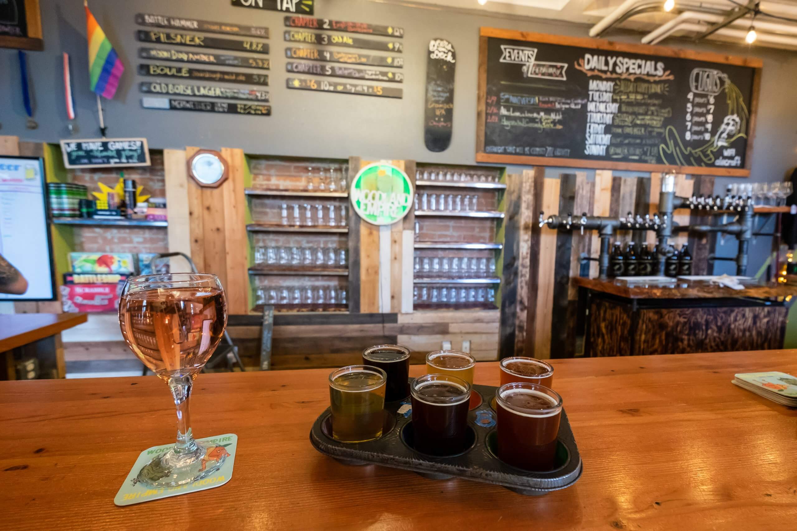 Test out a beer flight at Woodland Empire. Photo Credit: Traveling Newlyweds.