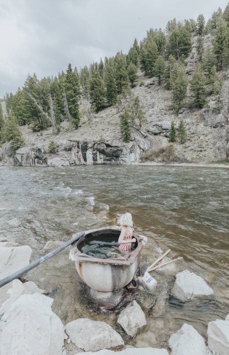 woman soaking in hot spring
