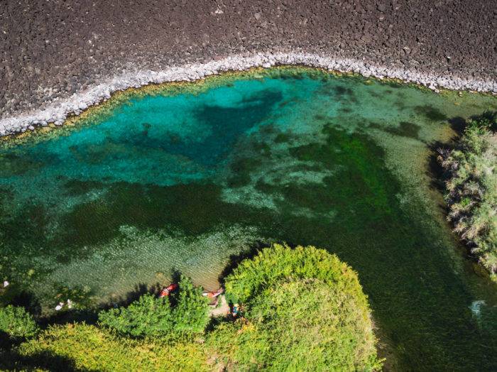 Explore the exotic waters of Blue Heart Springs. Photo Credit: Rolling Van Creative.