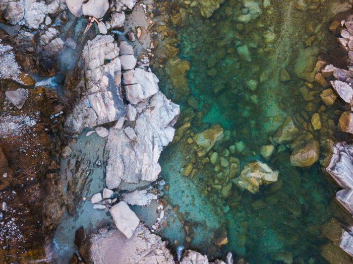 Stop by Kirkham Hot Springs for a riverside soak. Photo Credit: Rolling Van Creative.