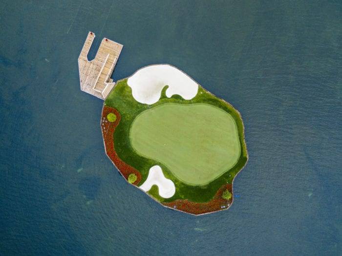 Enjoy a one-of-a-kind golfing experience at Coeur d’Alene Resort’s renowned floating green. Photo Credit: Idaho Tourism.