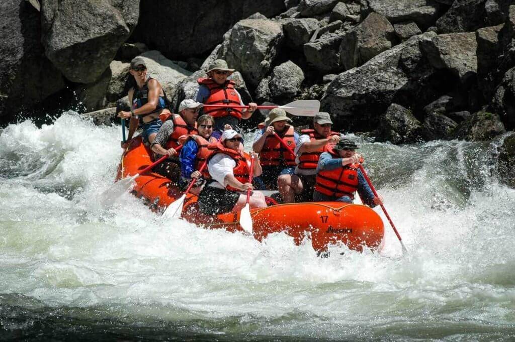 A family whitewater rafting down the South Fork of the Main Payette River.