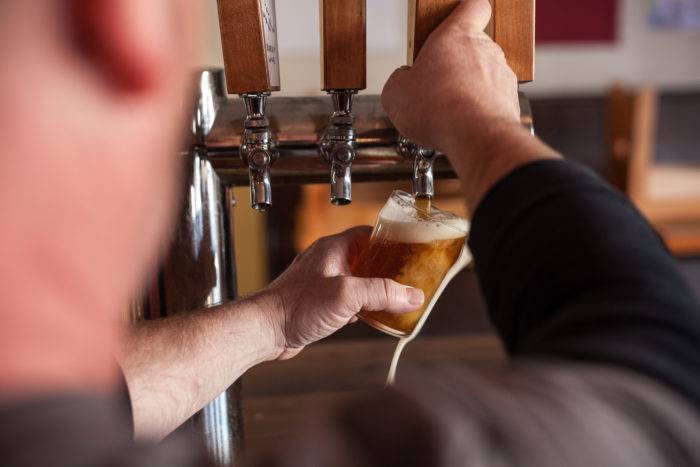 Pouring a glass at Payette Brewing.