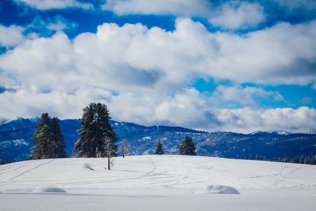 A mountainous landscape in the winter.