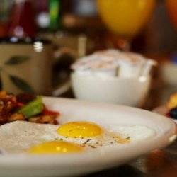 A plate of breakfast food.