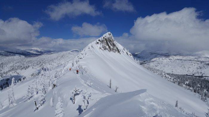 Backcountry views of snow covered mountains.