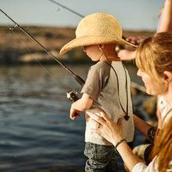 A child and mother fishing.