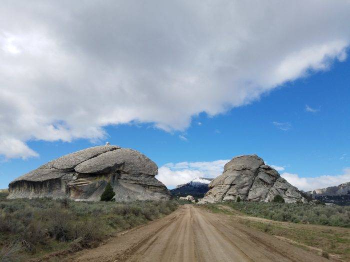 Two giant rocks with a road between them.