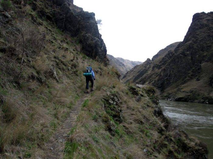 Hiking along the river in Hells Canyon. Photo Credit: Denise Lauerman.