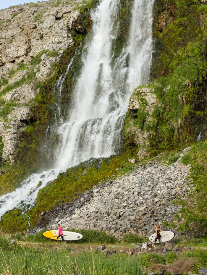 Water pours from the canyon walls creating magical waterfalls.