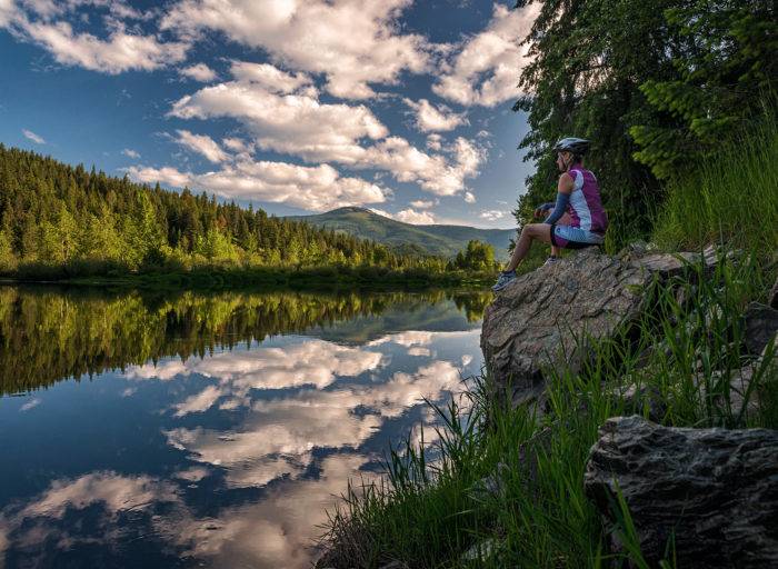 woman looking at a lake