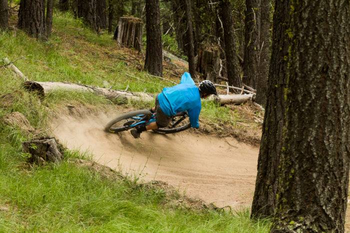 mountain bike rider going around a tight corner