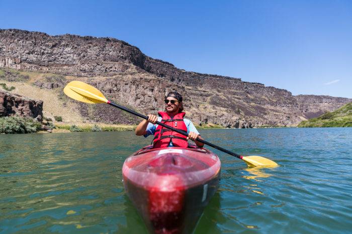 man kayaking