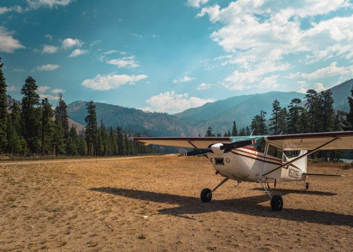 small airplane at backcountry airstrip