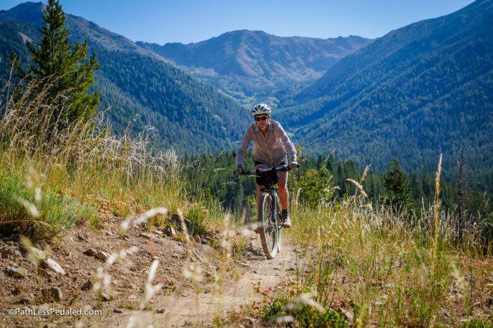 mountain biker riding through the mountians