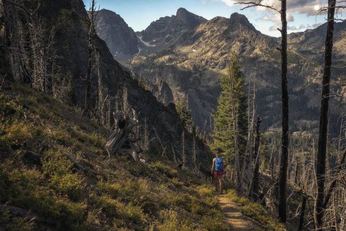 hiker in high mountain peaks