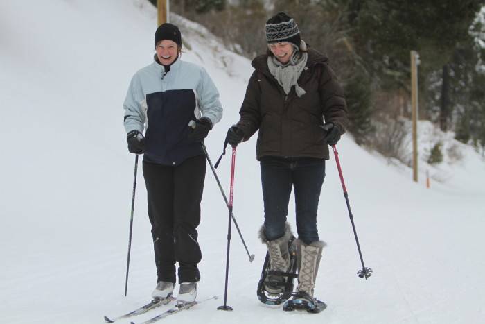 Female cross country skier and snowshoer on the trail at Bogus Basin.