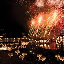 Fireworks exploding over coeur d'alene resort at night