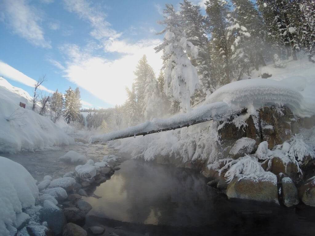 Steam rising from a mountain hot spring.