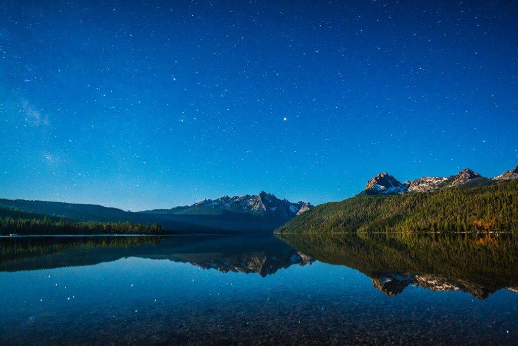 Lake with mountains at dusk