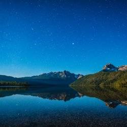 Lake with mountains at dusk