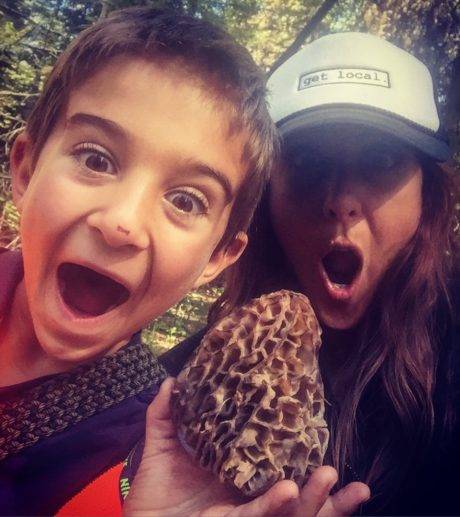 two people holding giant morel mushroom