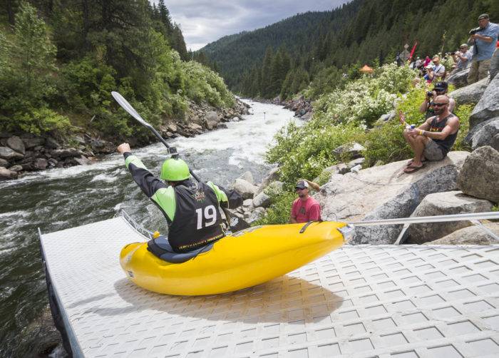 kayaker coming down boat launch