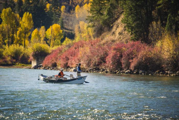 people fishing out a drift boat