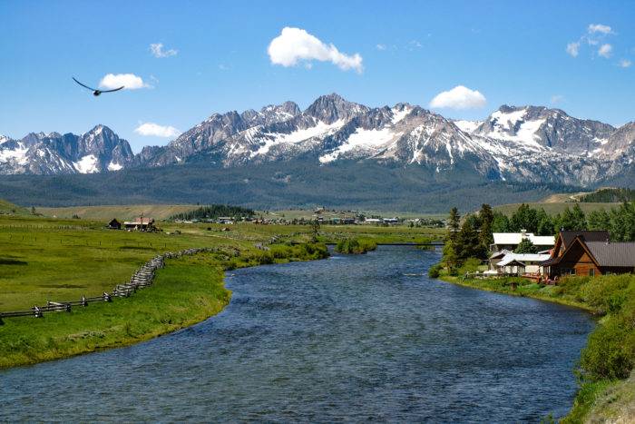 rugged mountains with river in foreground