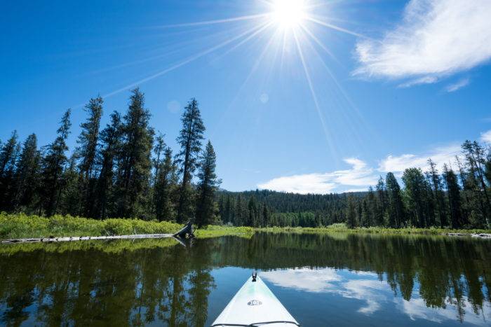 tip of a kayak in a lake