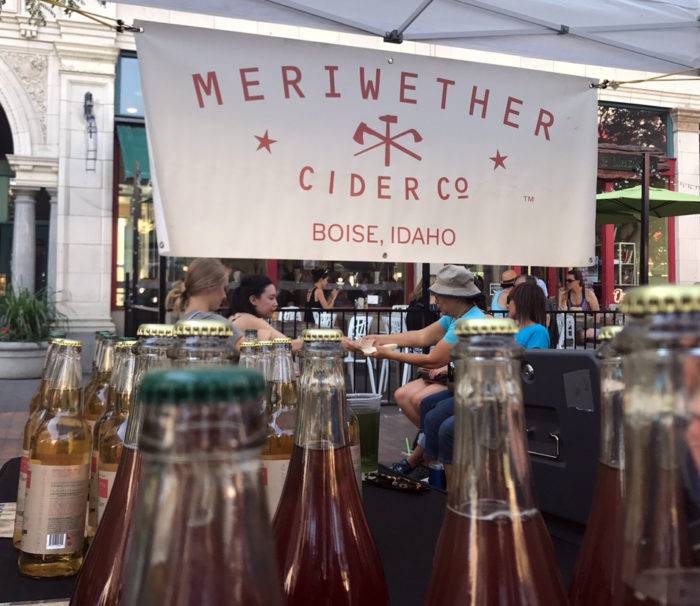 bottles of cider at outdoor stand