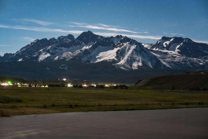 rugged mountains in full moon light