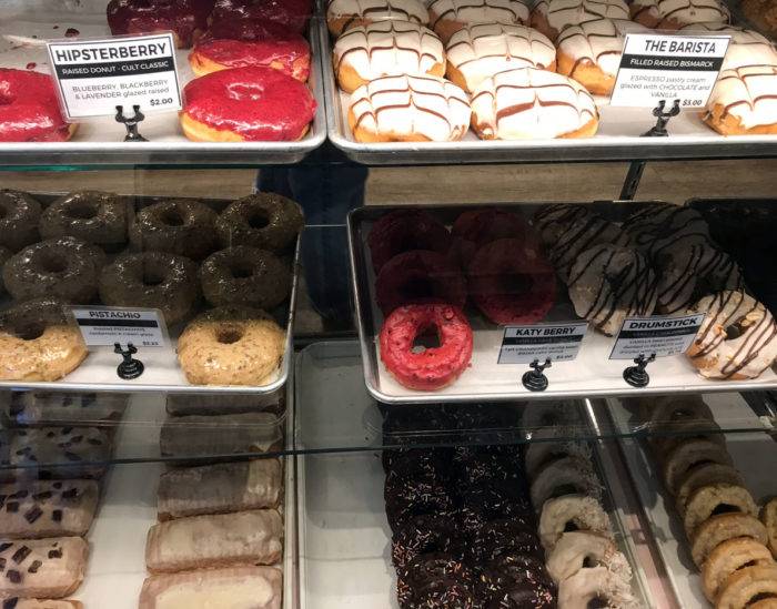 colorful doughnuts in a case