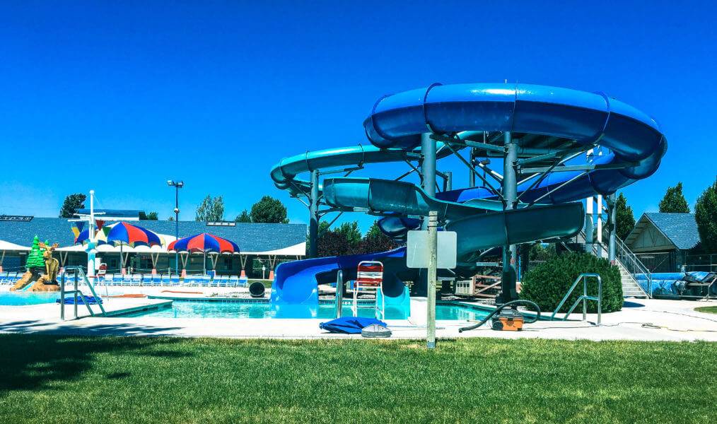 Two blue waterslides at Hamilton-Lowe Aquatics Center.