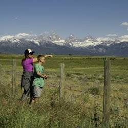 woman and child looking at mountains