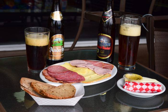 meat and cheese plate with beers