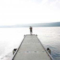 dad and child on dock