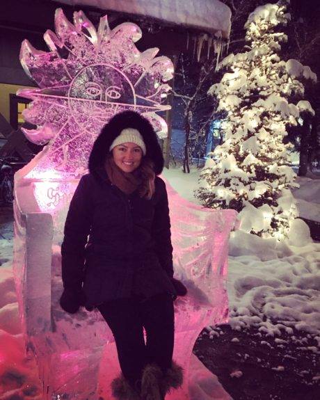 woman sitting on ice sculpture