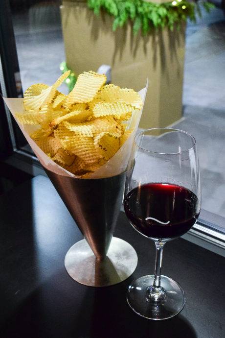 potato chips with a glass of wine