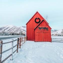 red barn in snowy field