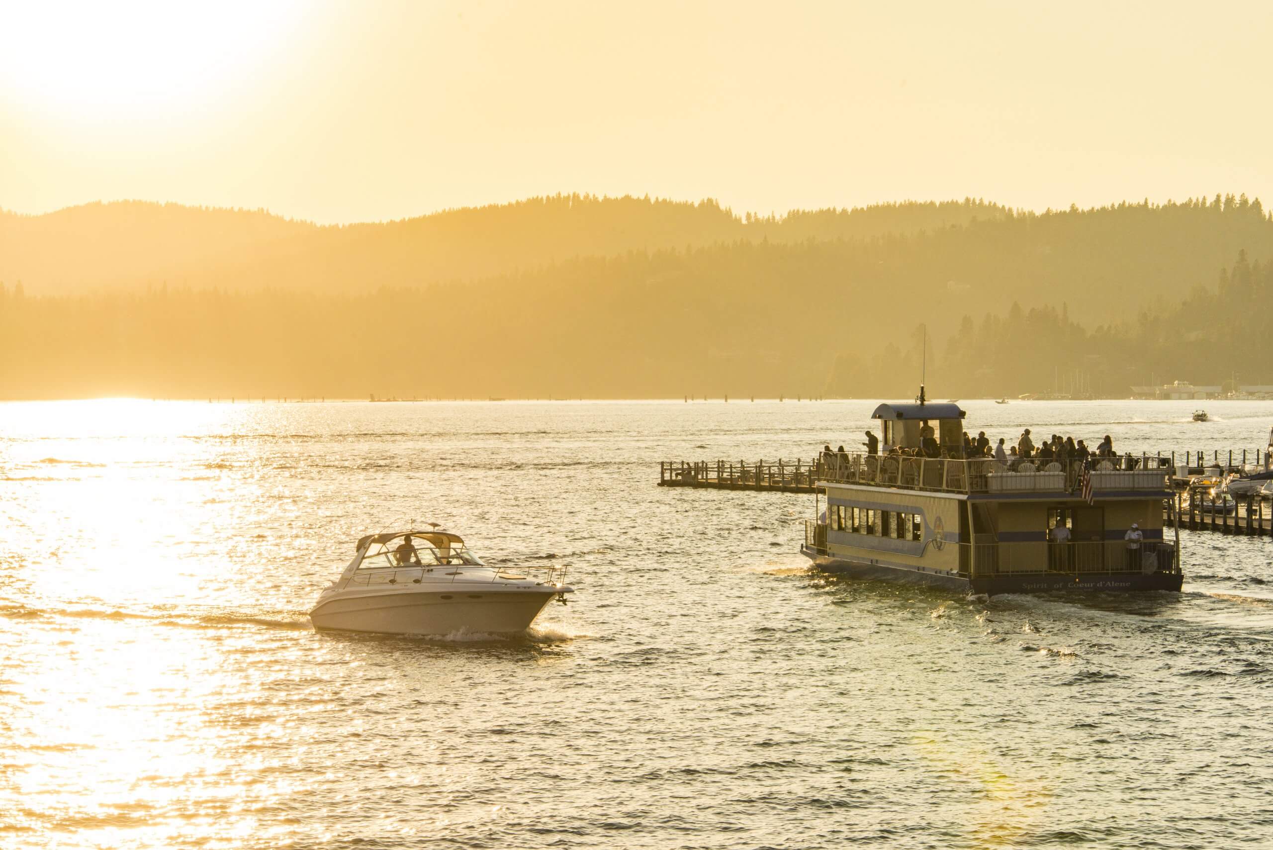 Two boats at sunset on Lake Coeur d'Alene.