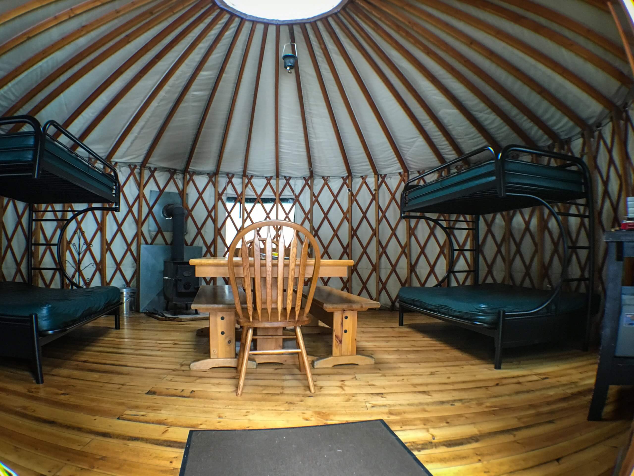 yurt surrounded by snow