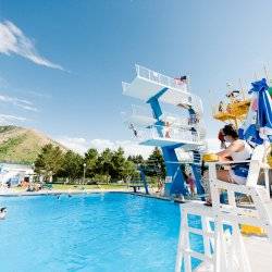 Guests swim at Lava Hot Springs Olympic Swimming Pool & Waterpark.