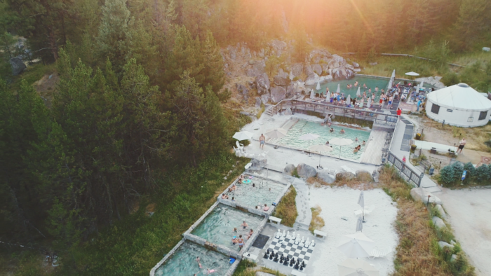 A scenic view of Gold Fork Hot Springs in the summer.