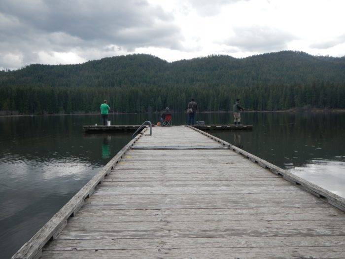 people fishing off a dock